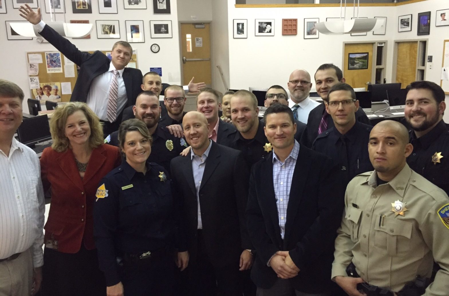 A photo of CMC's Fall 2015 CLETA cadets with CMC President Carrie Besnette Hauser at their graduation,