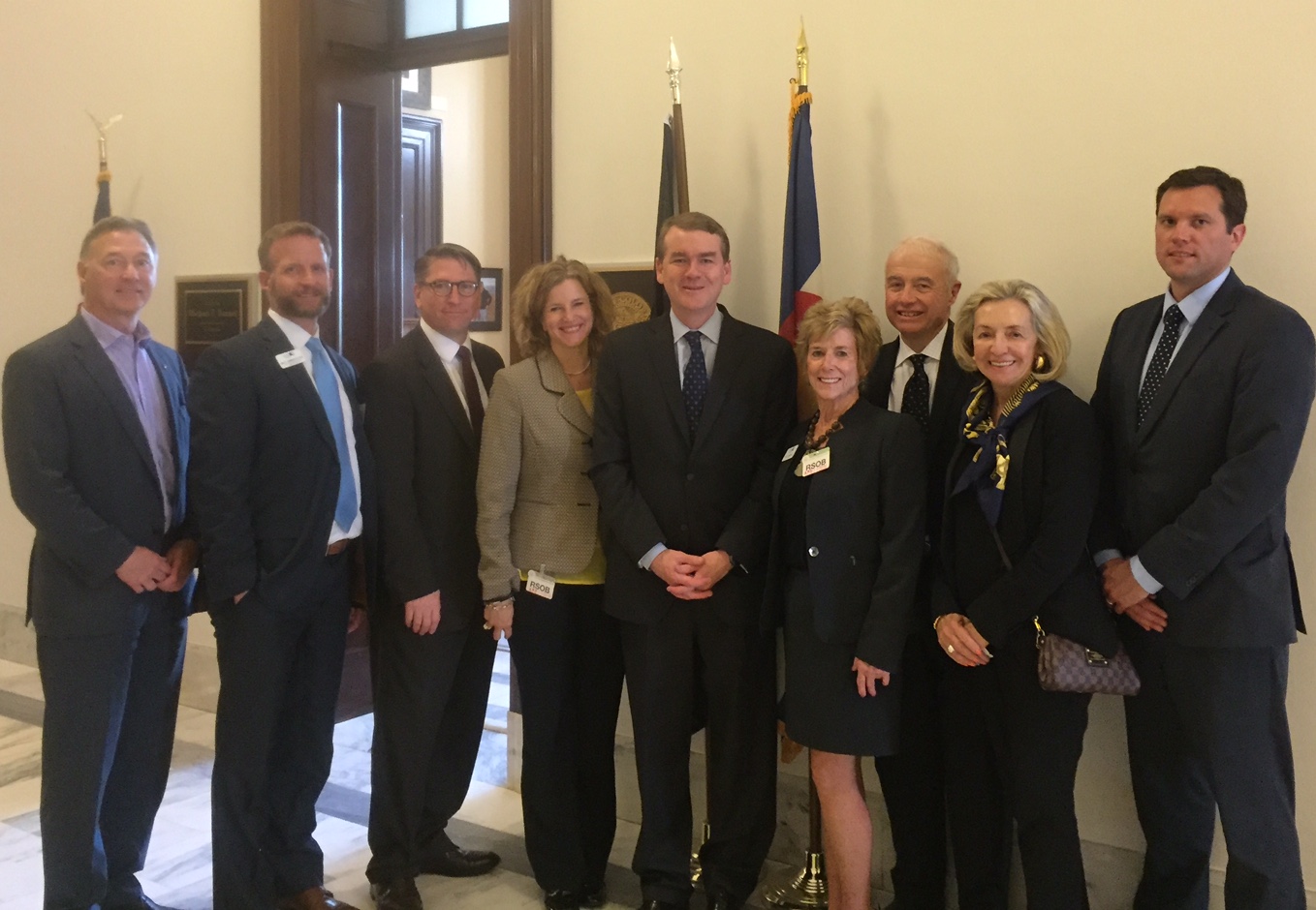 Photo of CMC staff meeting with Michael Bennett, U.S. Senator from Colorado