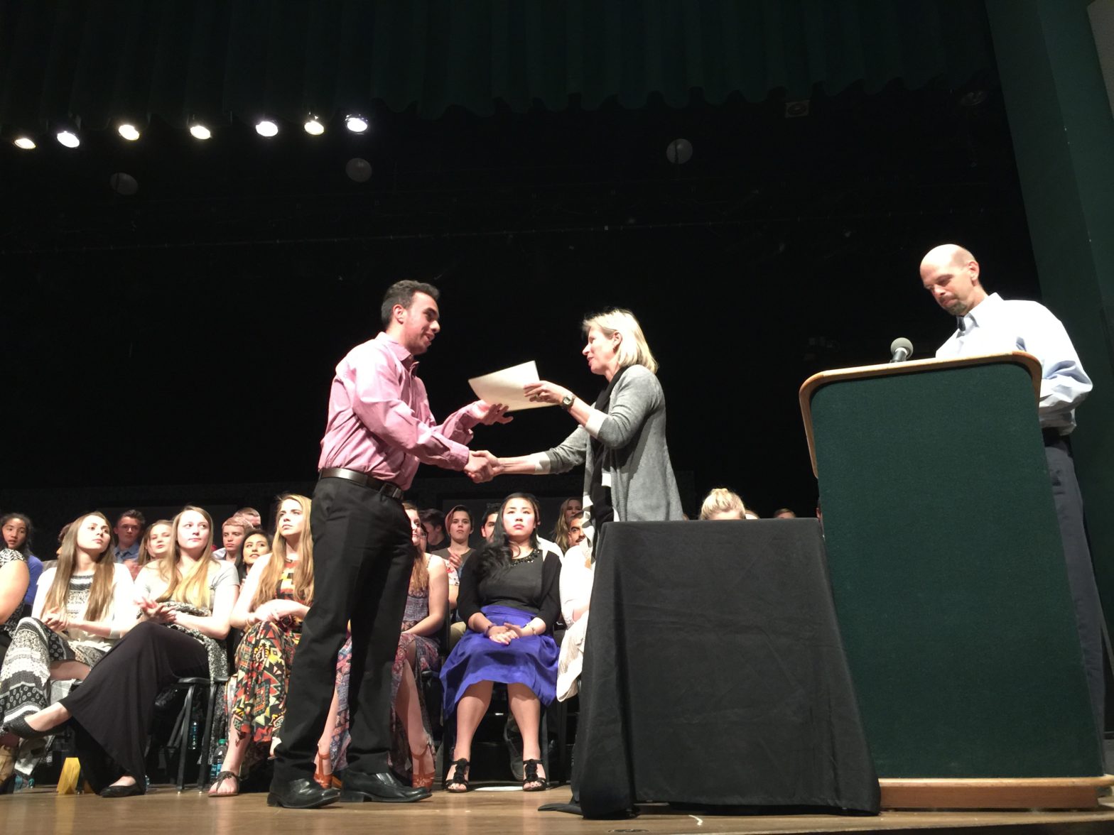 Photo of student receiving scholarship award