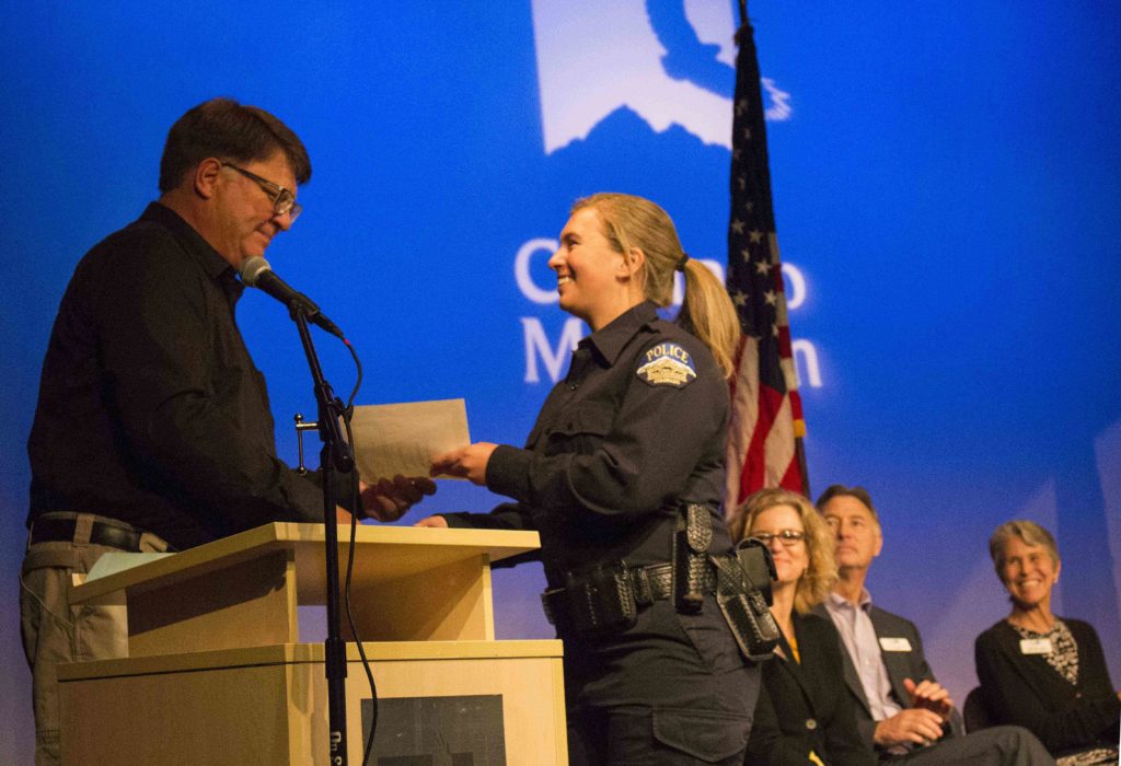 Photo of a CLETA graduate receiving her diploma, CMC Spring Valley