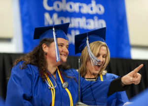 CMC grads Michael Curry and Kay Dodds share the podium as they address their fellow graduates at Colorado Mountain College School of Nursing’s pinning and graduation ceremony on May 7