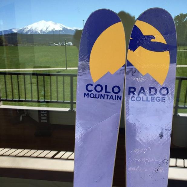 Photo of skis with CMC logo on them and Sopris in background