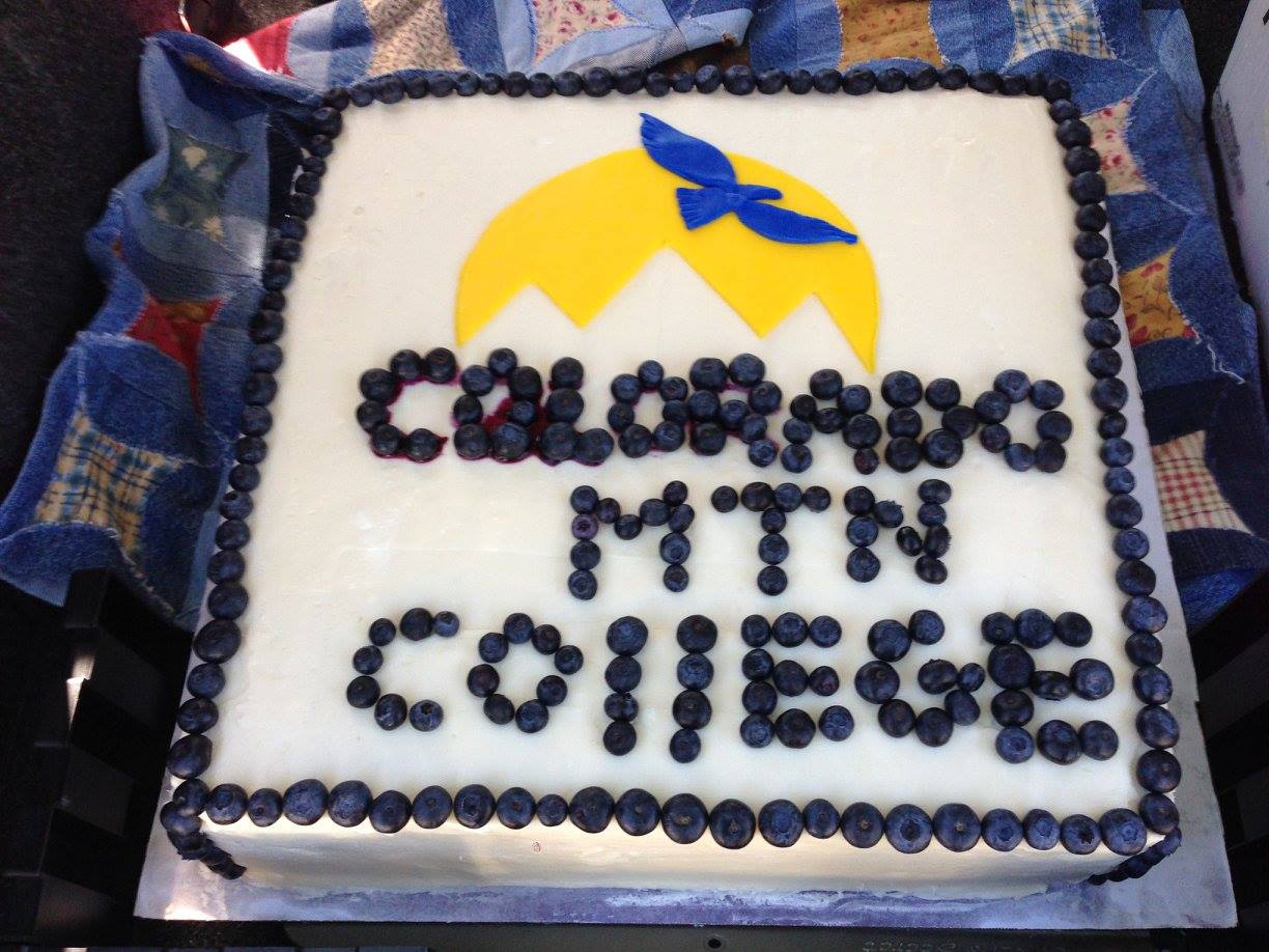Photo of cake with new CMC logo