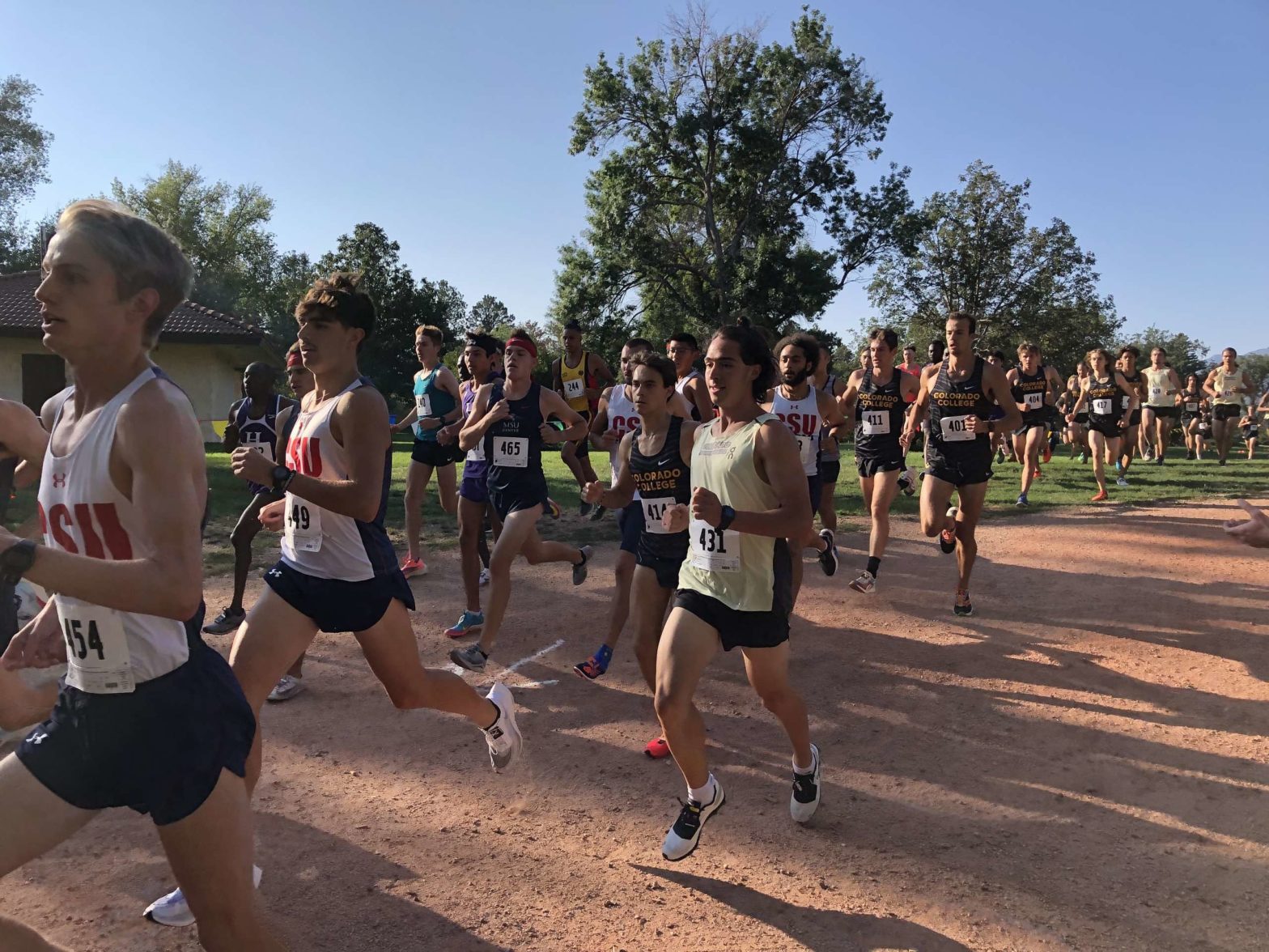CMC’s top runner Jason Macaluso (yellow singlet) gets off to a fast pace at the start of the Ted Castaneda Cross-Country Classic in Colorado Springs on Sept. 11, 2021.